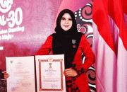 Harganas Ke-30 Ketua TP PKK Dharmasraya  Raih Satya Lencana Wira Karya