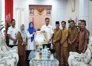 Meraih Capaian Terbaik : Pemkab Dharmasraya Dapatkan Penghargaan Dari BPJS Kesehatan Masyarakat