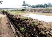 Normalisasi Sungai dan Peningkatan Tanggul Sukses di Desa Palu Manan Bebas Banjir